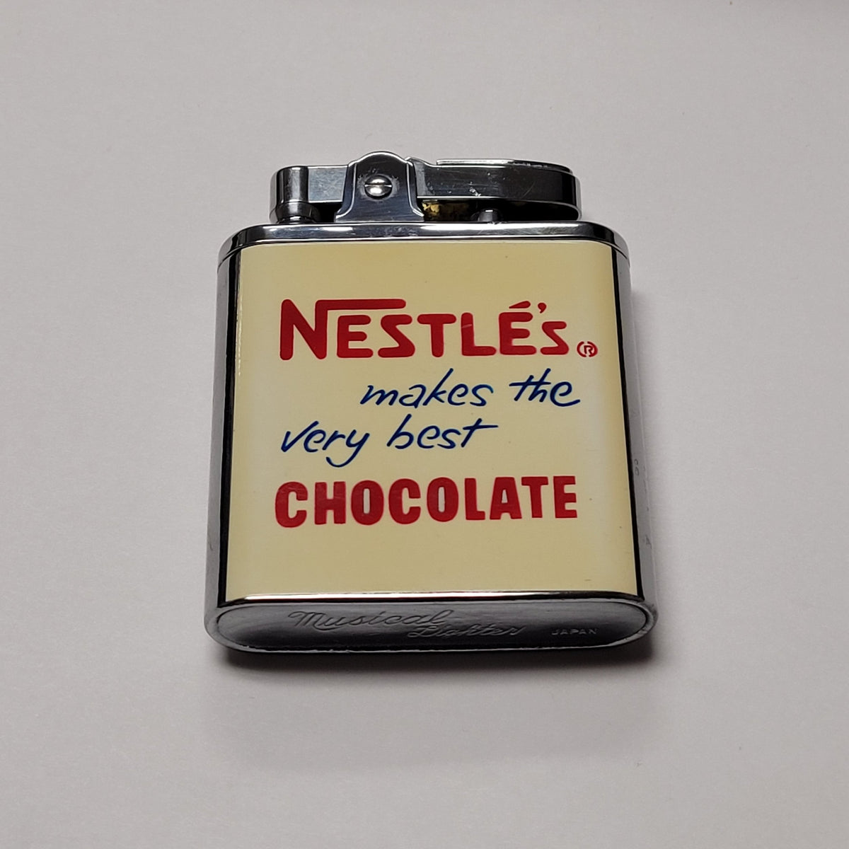 1950s Nestles Chocolate Musical Lighter