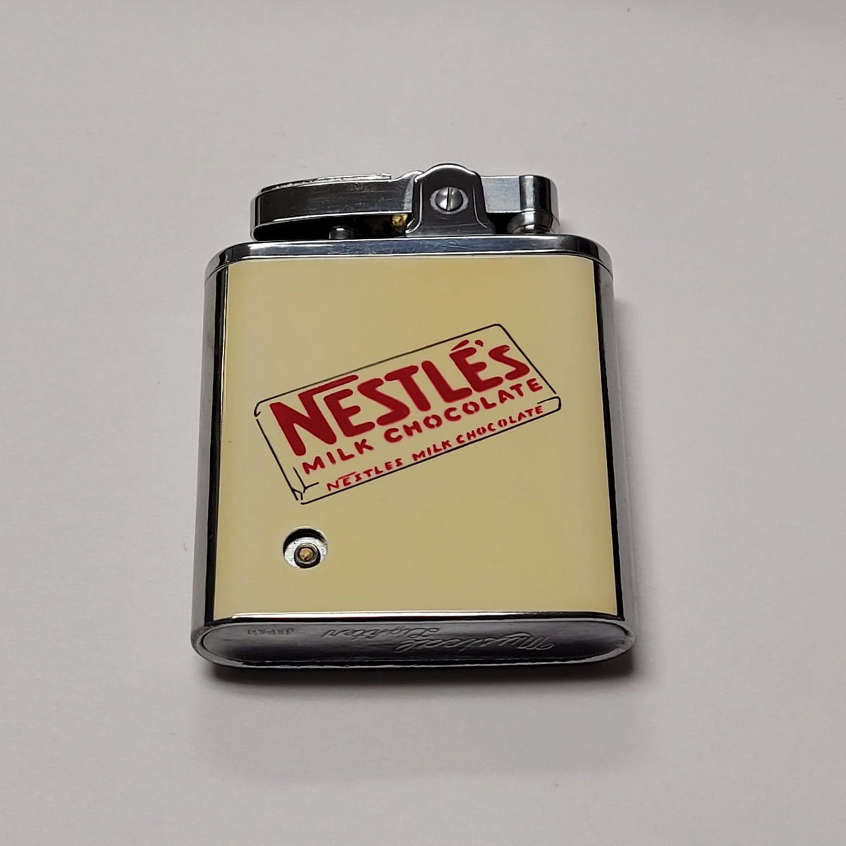 1950s Nestles Chocolate Musical Lighter