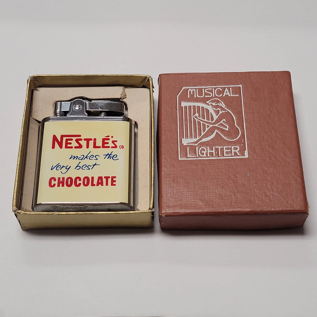 1950s Nestles Chocolate Musical Lighter