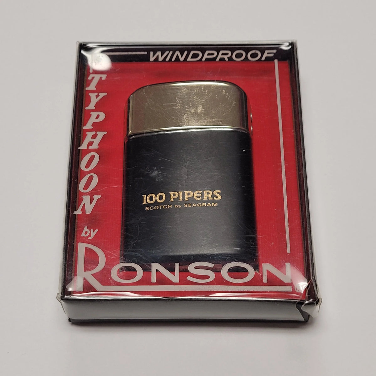 1950s Ronson Typhoon 100 Pipers Seagram Scotch Lighter