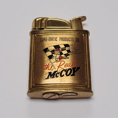 1950s Evans Banner the Real McCoy Pocket Lighter