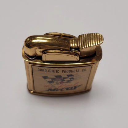 1950s Evans Banner the Real McCoy Pocket Lighter