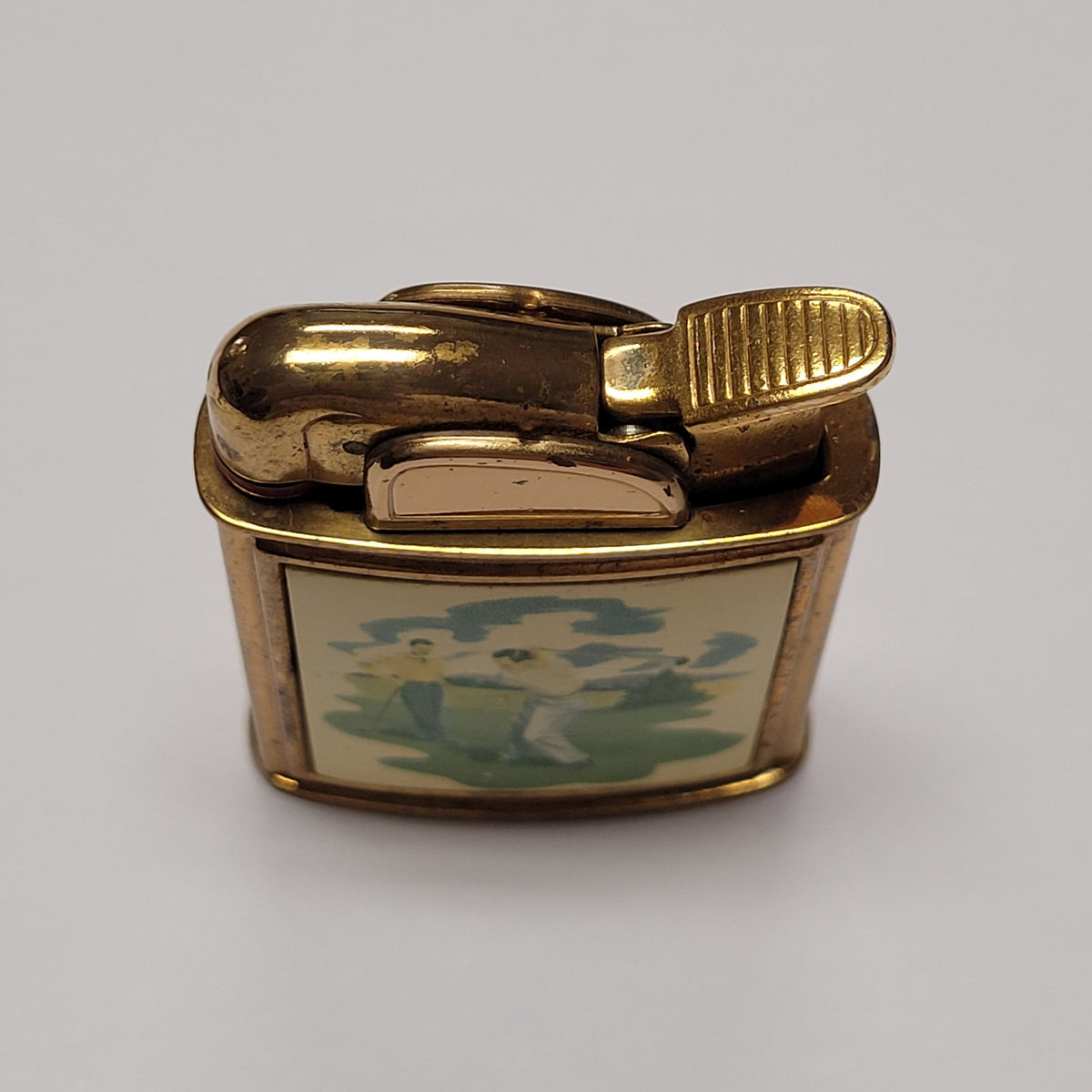 1950s Evans Banner Golfer Scene Pocket Lighter